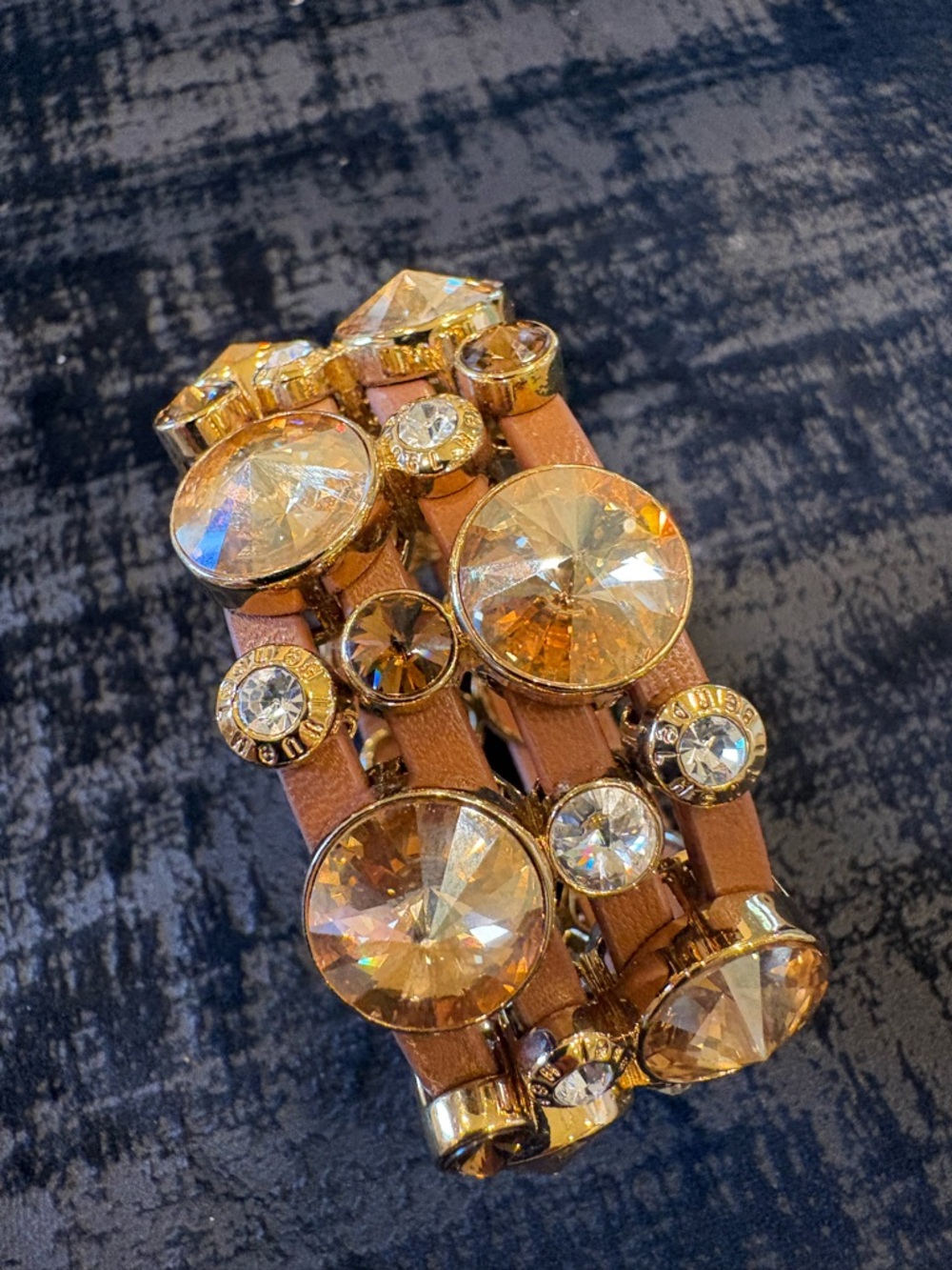 henri bendel Gold-Tone Bracelet with Tan Straps and Amber Crystals